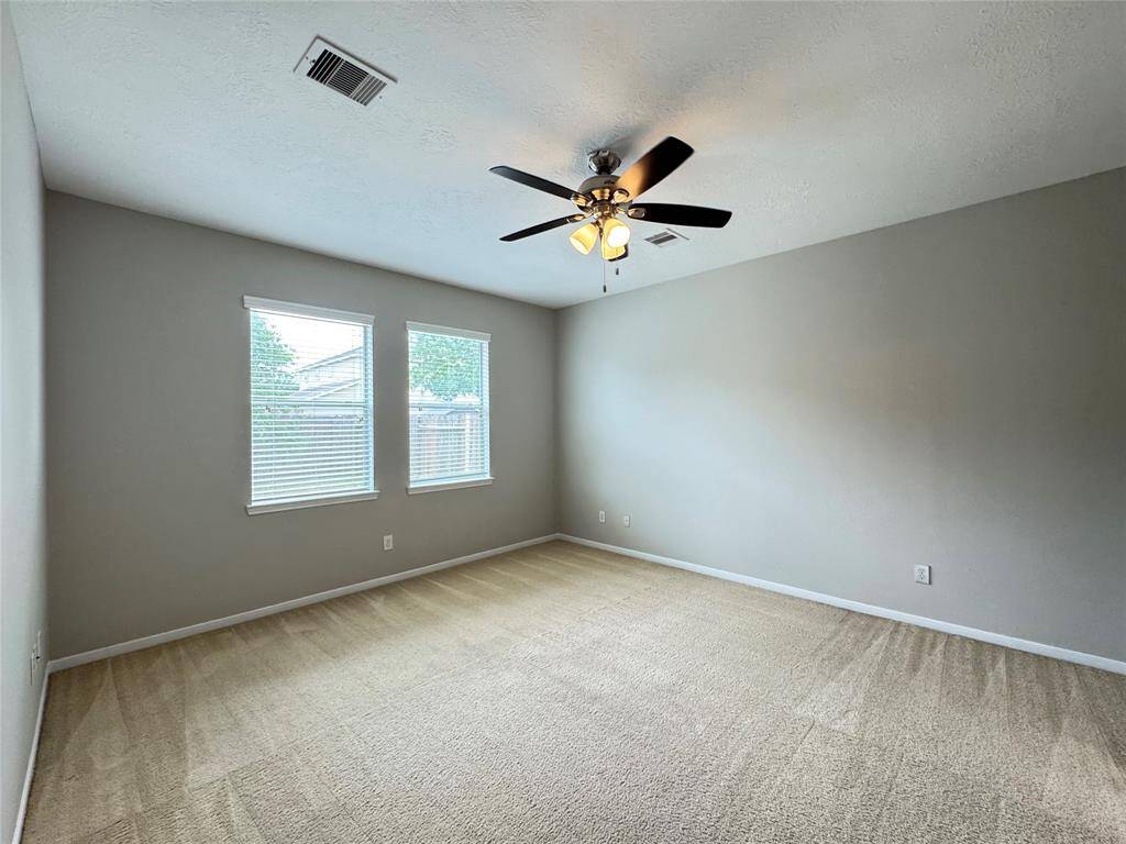 primary bedroom, nice neutral carpets in all 3 bedrooms
