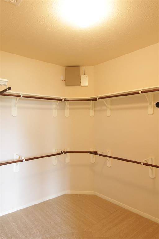 larger primary walk-in closet