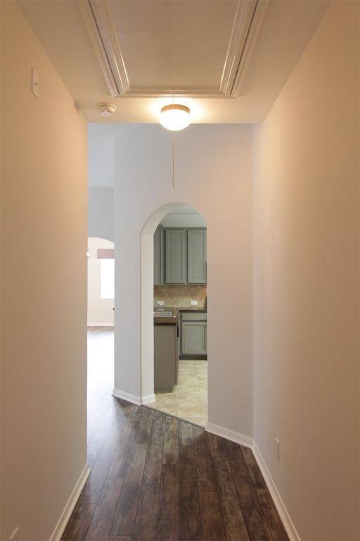 hallway looking back toward kitchen & front of home