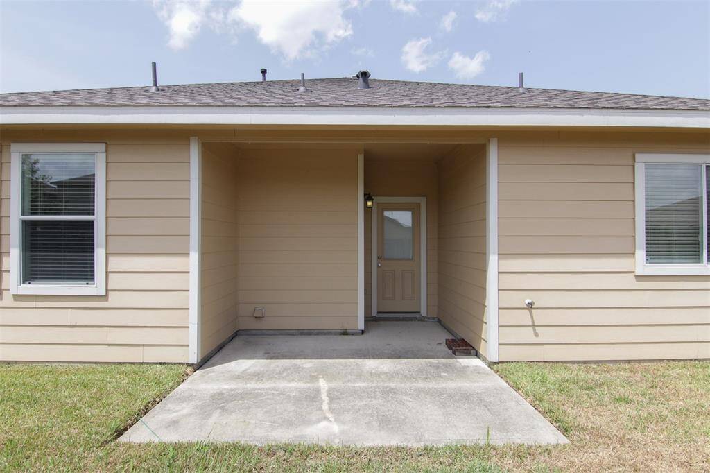 back of house; covered patio
