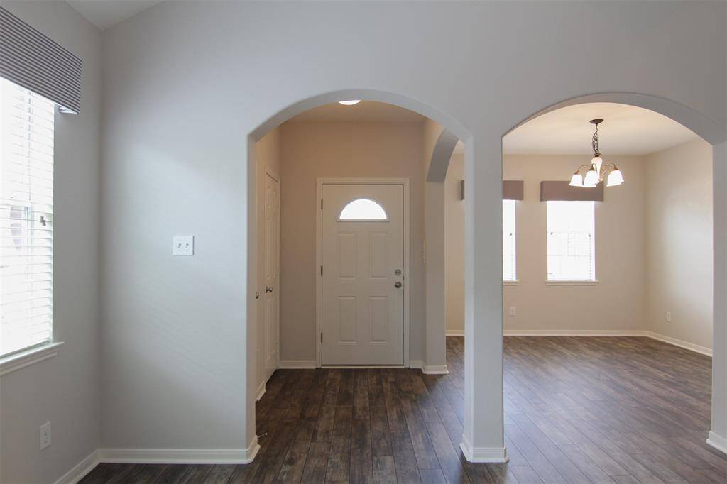 front entry leads to formal dining & living; 2 coat closets at foyer