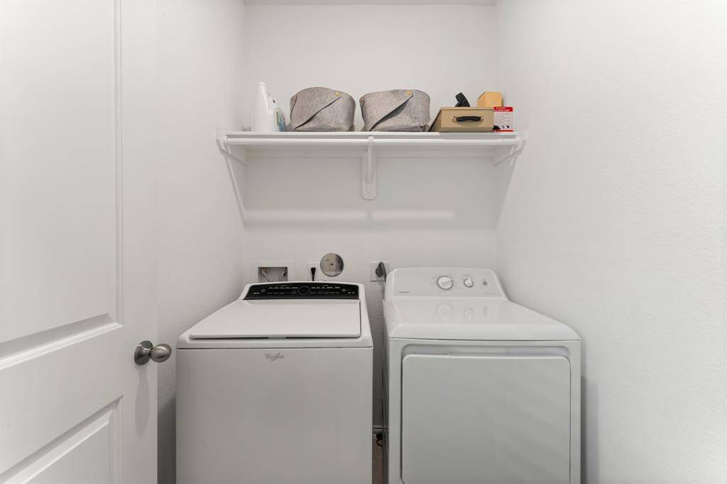 Laundry room across from Half bath.