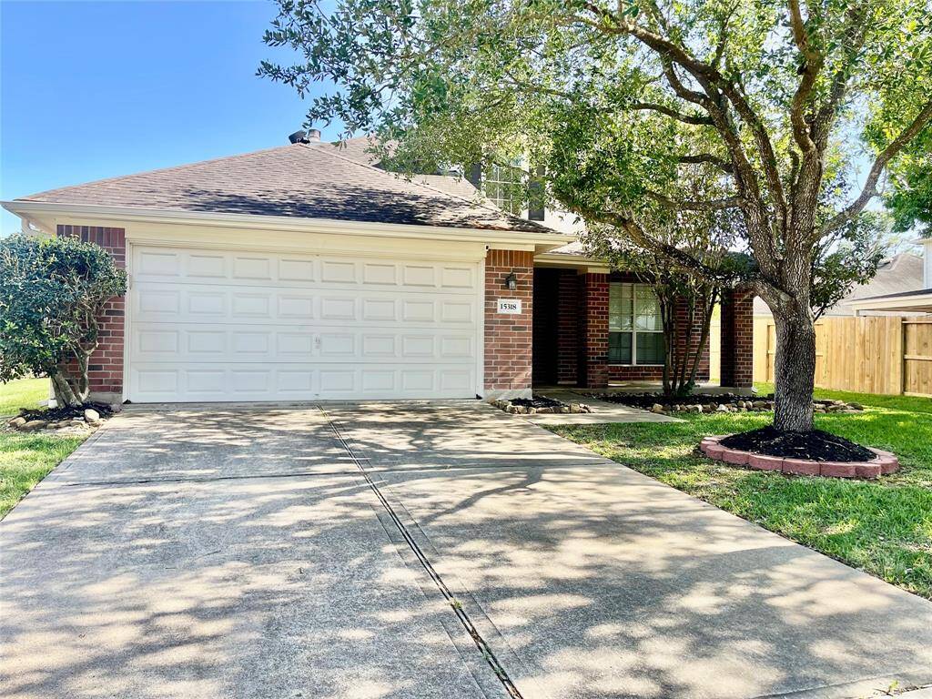 Charming single-story brick home with a two-car garage and a welcoming front yard. Features mature trees and a well-maintained driveway. Ideal for families seeking a cozy suburban setting.