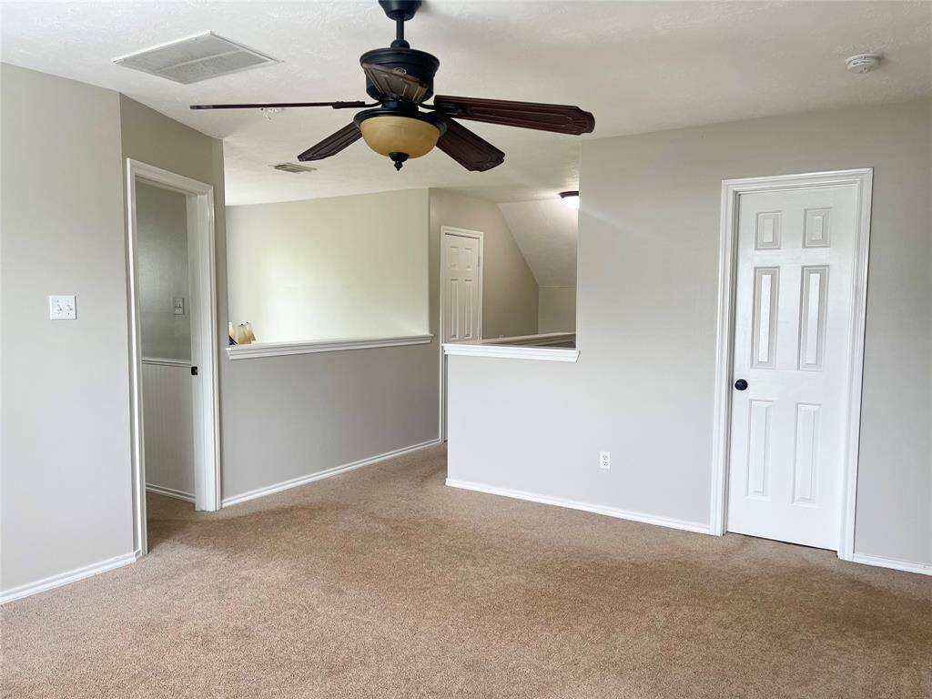 Spacious game room perfect for entertainment and relaxation.