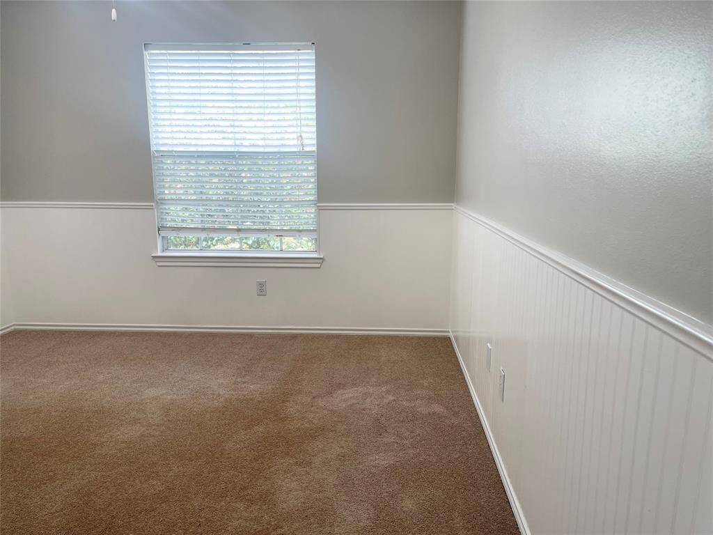 Huge family room with lots of natural light and cozy fireplace