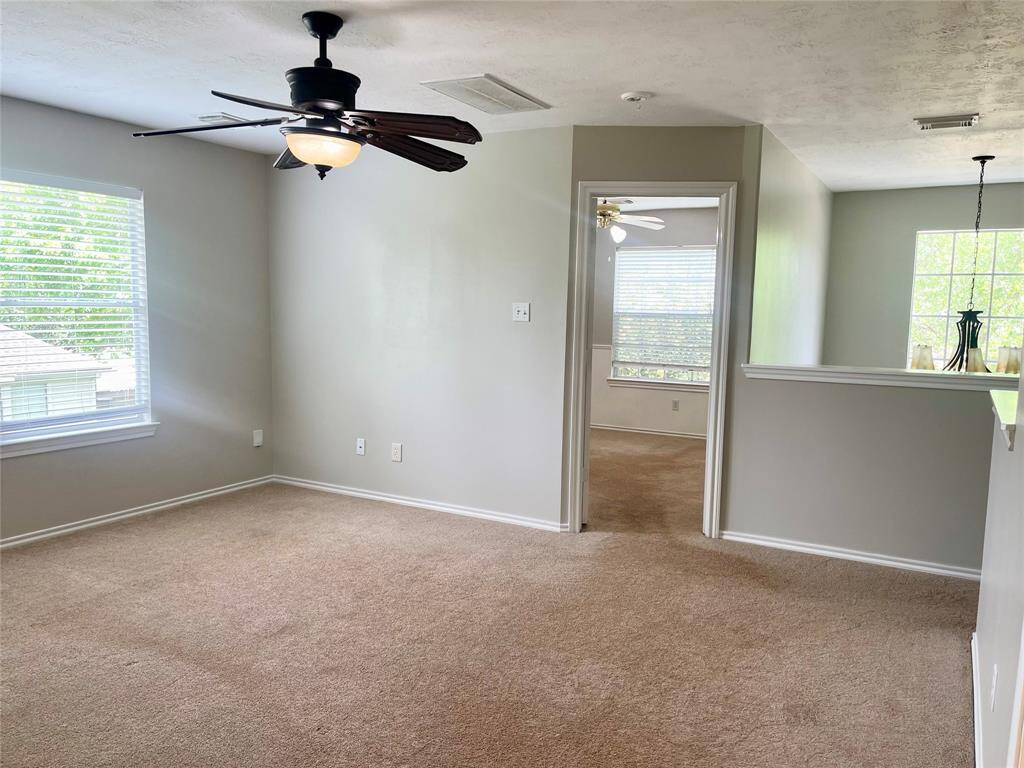 Kitchen overlooking into family room and breakfast room.