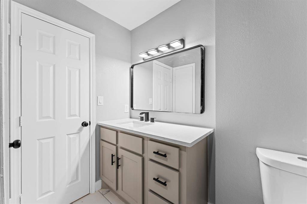 Lovely contemporary bathroom with black accents.