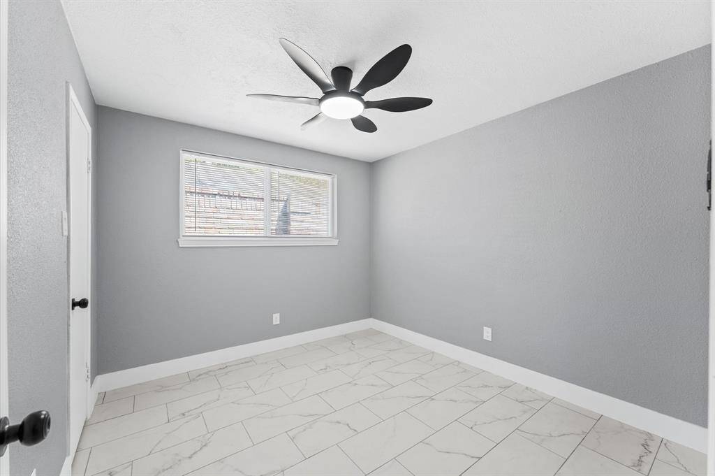 Retreat to a light-filled bedroom with great storage and contemporary ceiling fans.