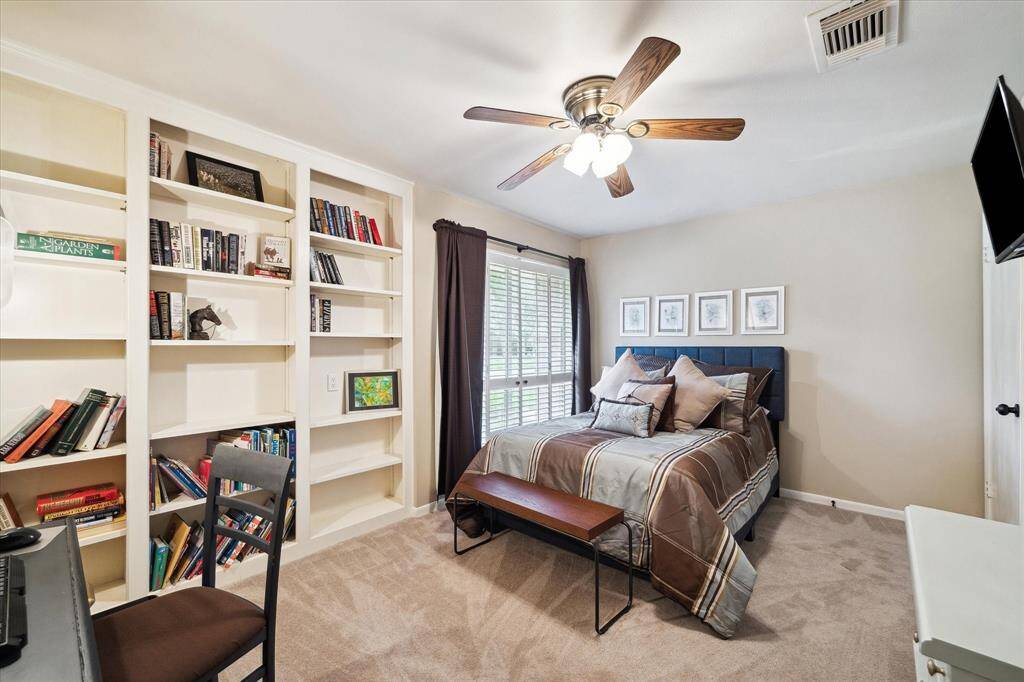 Secondary bedroom with built-ins.