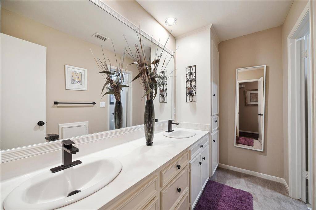 Full bathroom that services the secondary bedrooms.