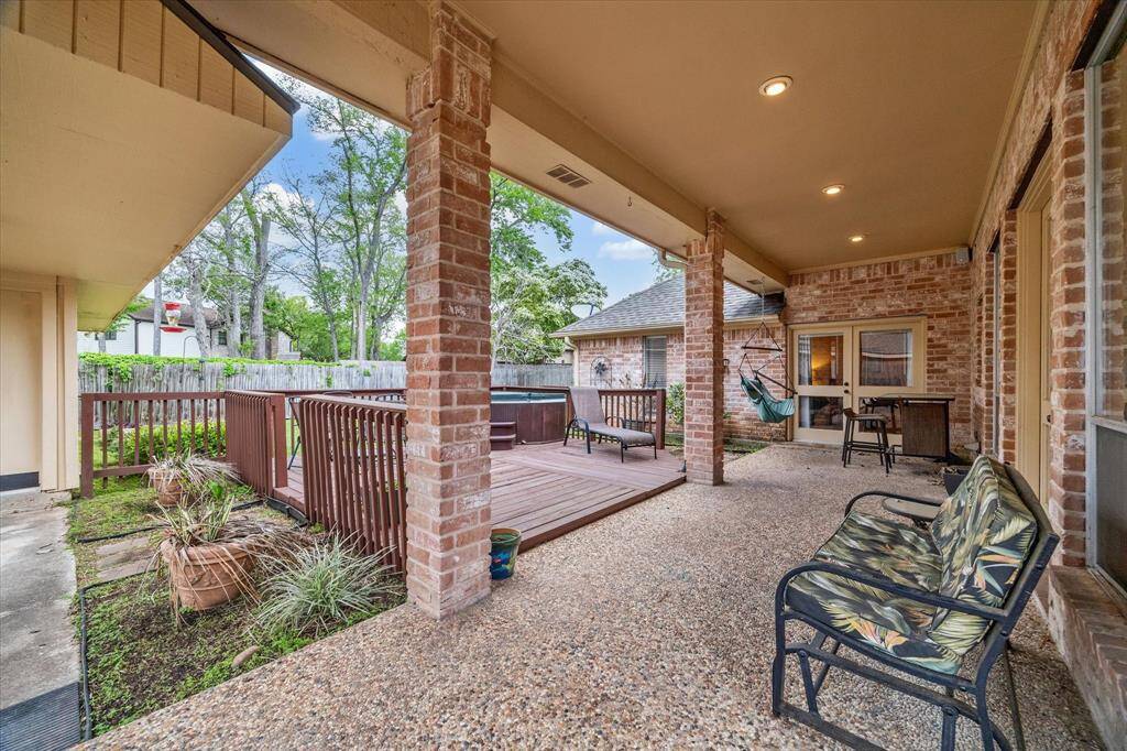 Covered porch is perfect for entertaining.