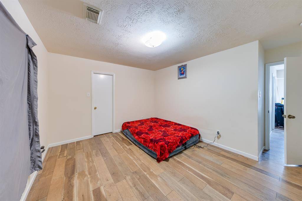 Imagine watching your children grow in this cozy third bedroom, where you’ll tuck them in at night and create memories that last a lifetime.