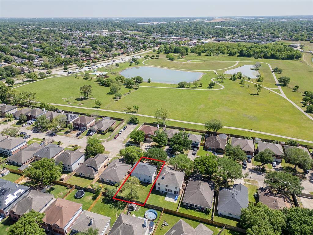 Aerial view showcasing walking trails, playgrounds, and lakes, all within easy reach for outdoor relaxation and family fun