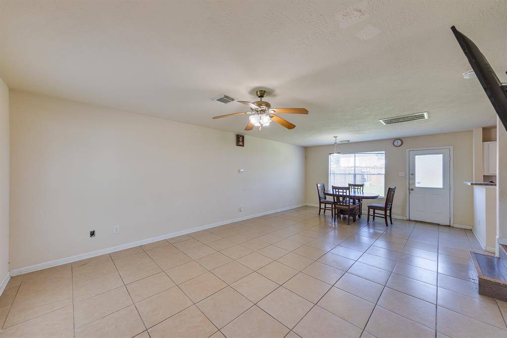 Bright living-dining combo, the heart of the home, perfect for family moments with easy flow to kitchen and backyard.