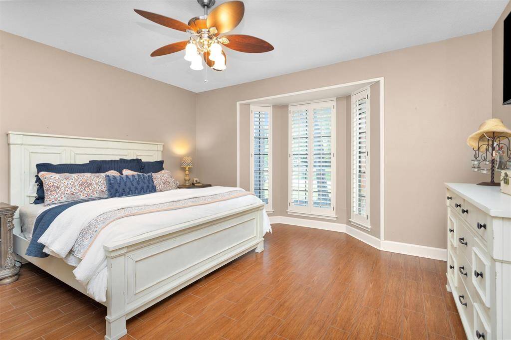 Primary suite is downstairs with bay window