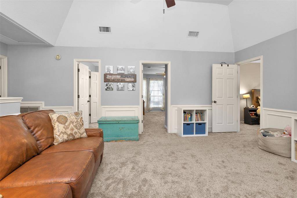 Seconardary bedrooms and bathroom lead off the game room