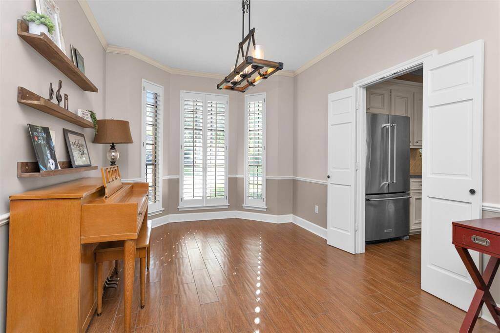Formal dining room with bay window