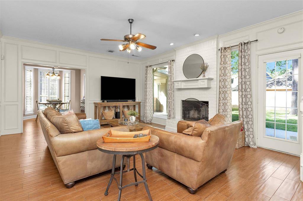 Formal living room wtih large picture windows