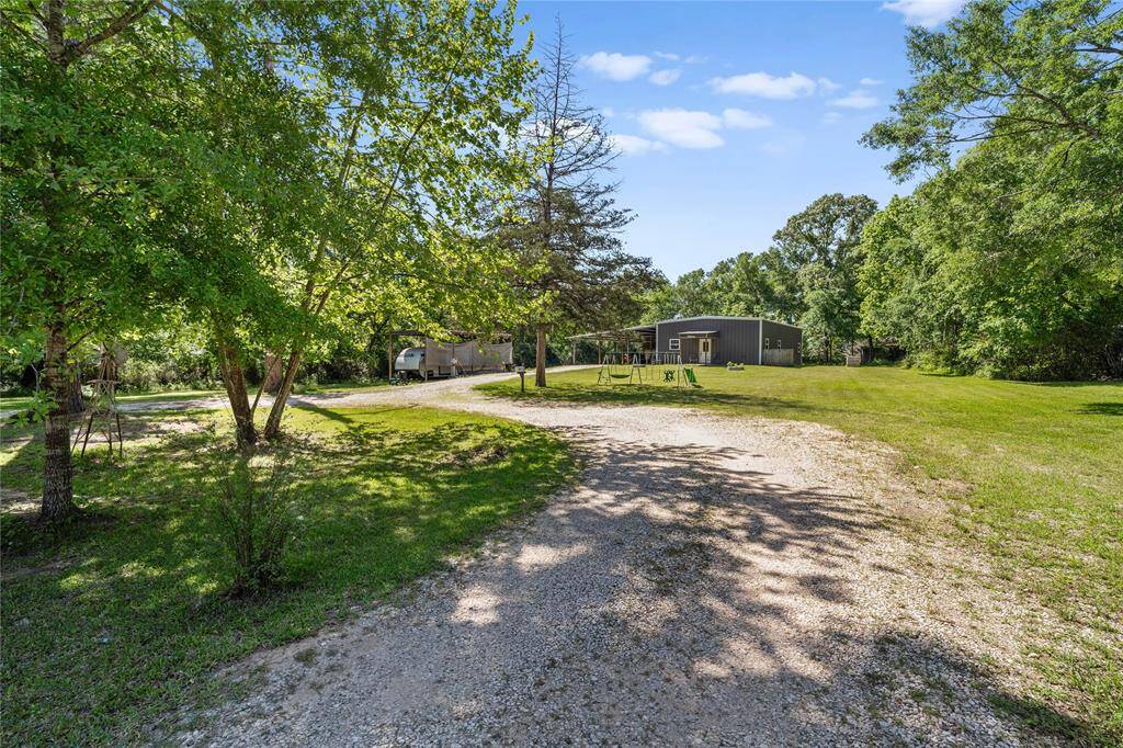 Welcome to your private oasis! Nestled on a spacious, 1.3-acre tree-lined lot, this serene property offers the perfect blend of open space and natural beauty. The long gravel driveway leads you to this cute country charmer!