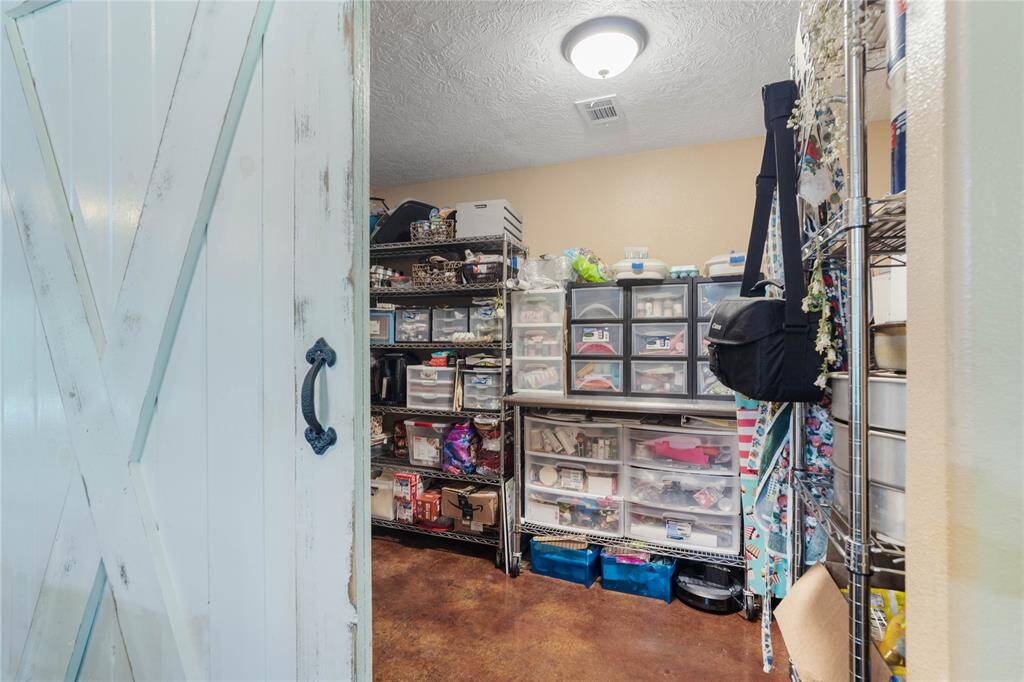 BUT, you will have to come and tour to see all of the space this 7x12 pantry boasts! A small office could be set up in here or add a closet and turn it into a small bedroom or play room.