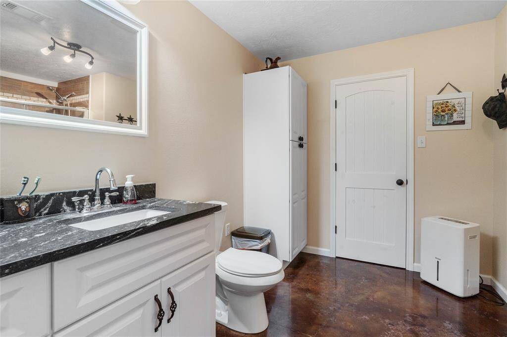 This primary bathroom is BIG! Measuring at 9x11 this bathroom offers a ton of room.  We certainly cannot forget about the 6x12 walk-in closet!!