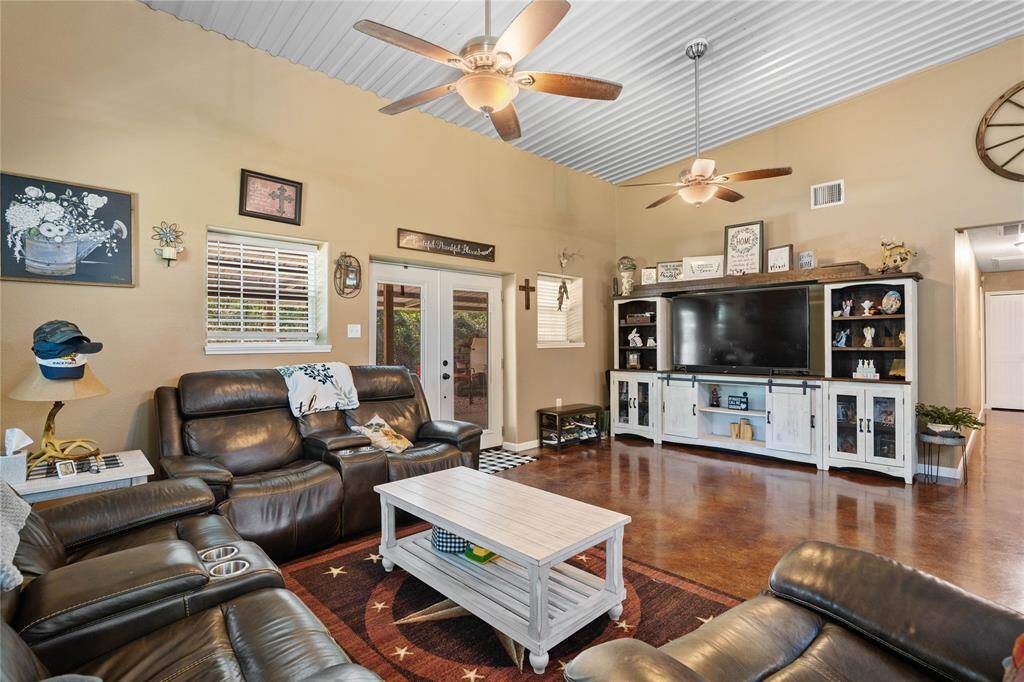 Come in from outside and enjoy the space you have to spread out and relax awhile. Hallway leads to both bedrooms and full guest bath.
