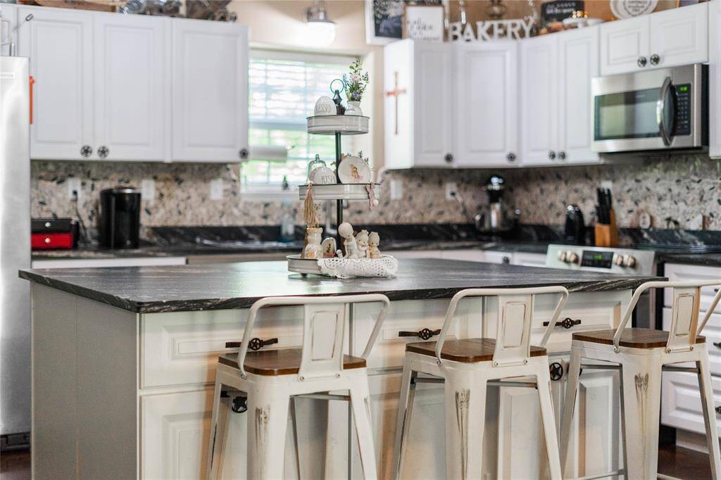 Have the kiddos gather around while they watch the meal being prepared, or maybe they will join in to help.  Never miss a moment while being in the kitchen and around this huge island that offers storage.