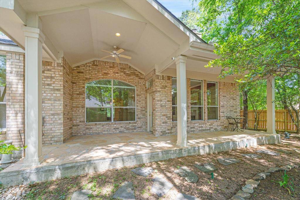 The long covered patio, offers plenty of space for outdoor living and entertaining. The thoughtful design provides both comfort versatility for a variety of activities.