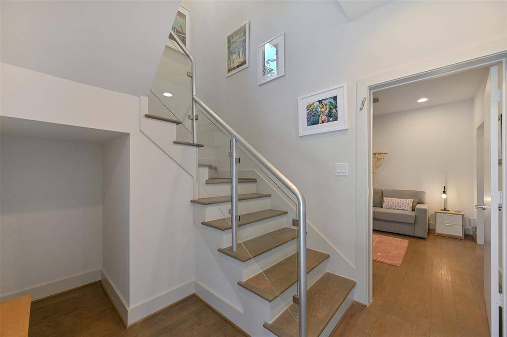 You are welcomed home to a large entry leading to the second floor and the first floor bedroom.