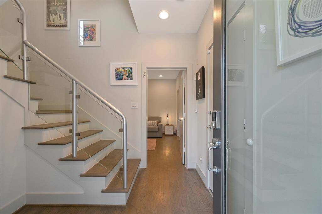 Entry with beautiful glass from door.