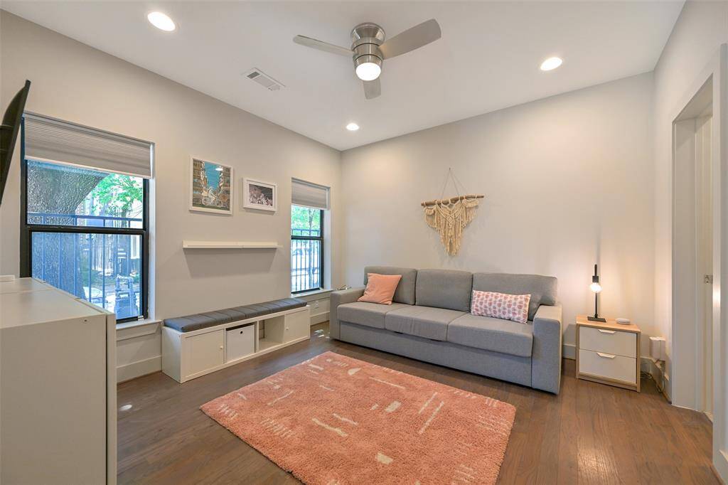 With plenty of natural light, this first floor bedroom with ensuite can be used as a flex space or guest room.