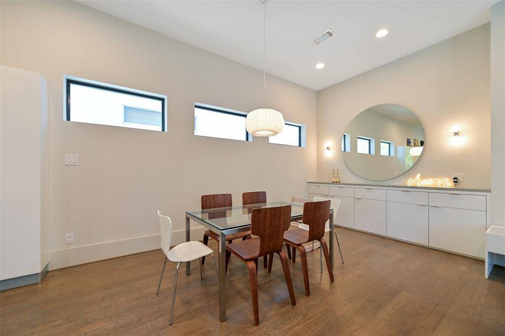 Spacious dining room with room for a large dining table to entertain guests.