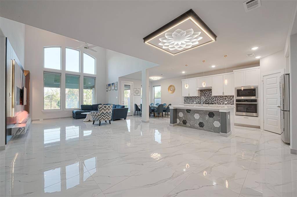 With tons of upgrades, ceiling light features, and impeccable interior décor, this home is the embodiment of luxury and comfort.