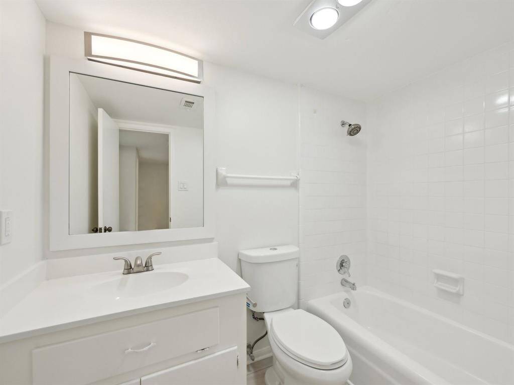 The Secondary Bathroom. Check out the updated lighting fixture!