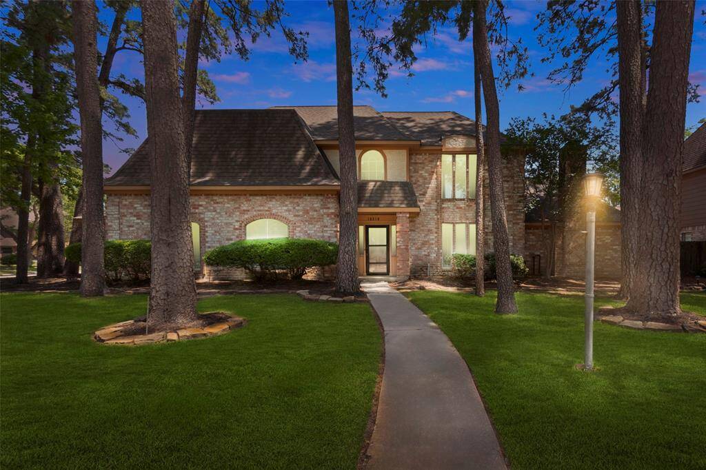 Twilight photo of exterior of home.