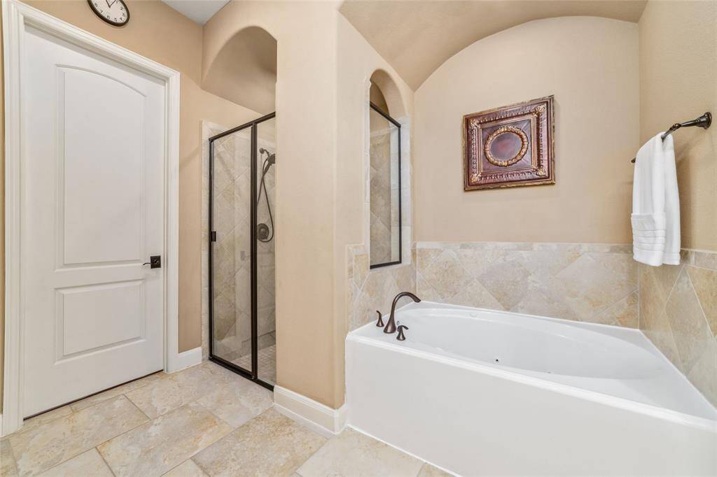 Garden tub with separate walk in shower ah so relaxing after a long day.