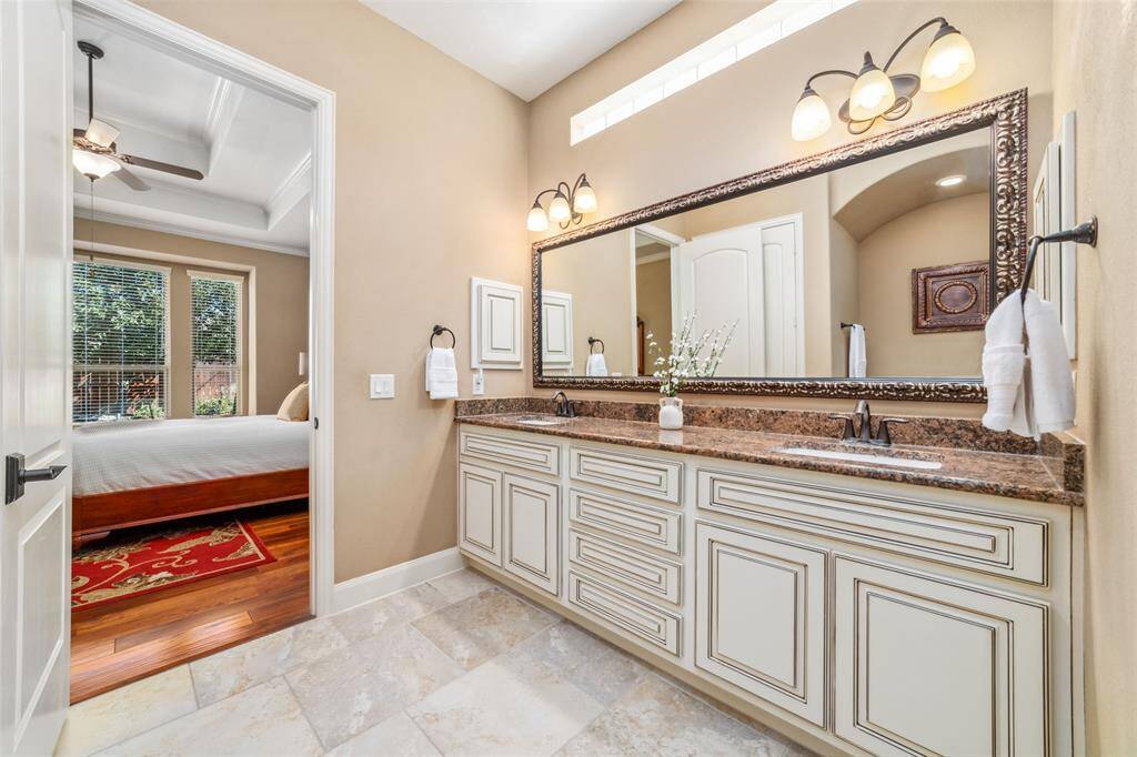 Double sink vanity and large vanity and mirror area.