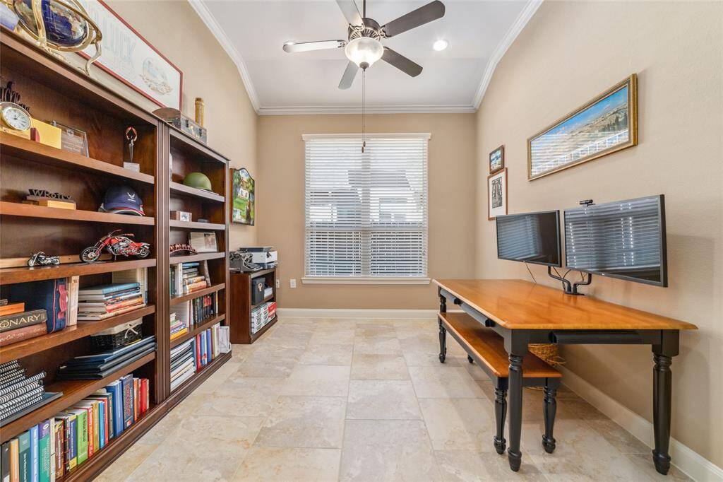 Great size private study with crown molding and beautiful tile flooring.