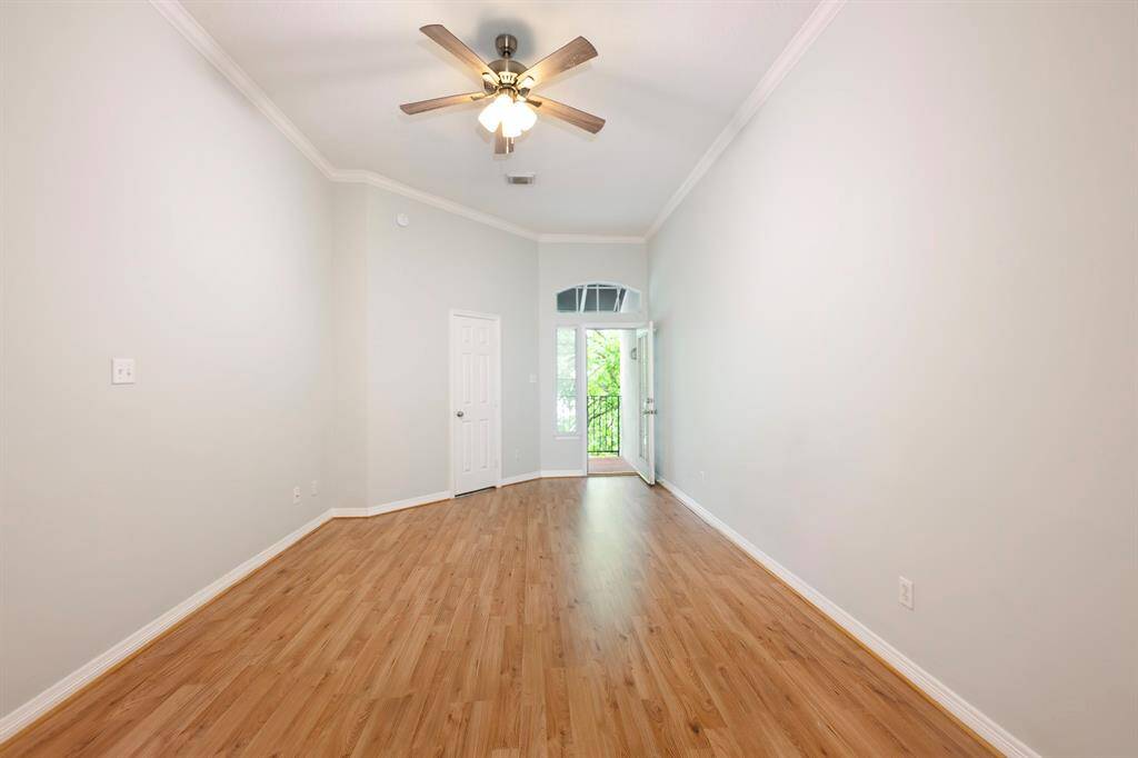 Another view of the primary bedroom with access to 2 balconies.