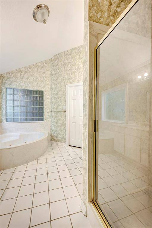 Separate shower and water closet.