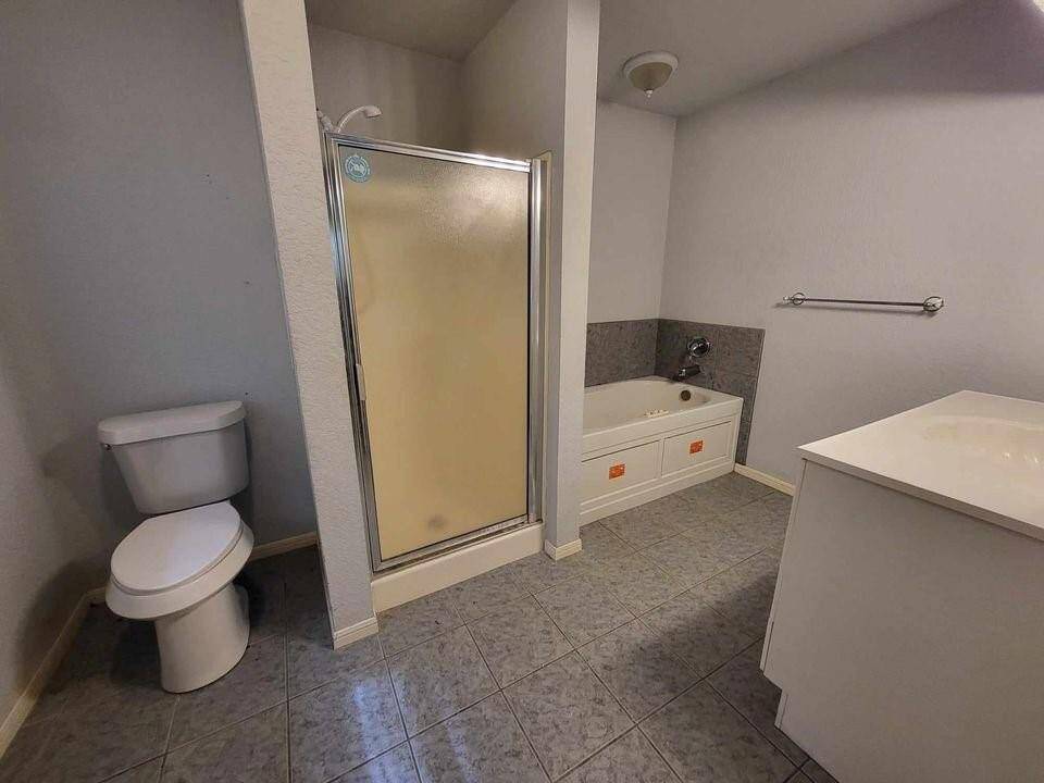 Master suite 1 bathroom with jetted tub & separate shower