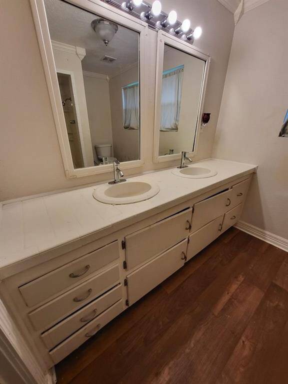 Master suite bathroom with his/her sinks & shower