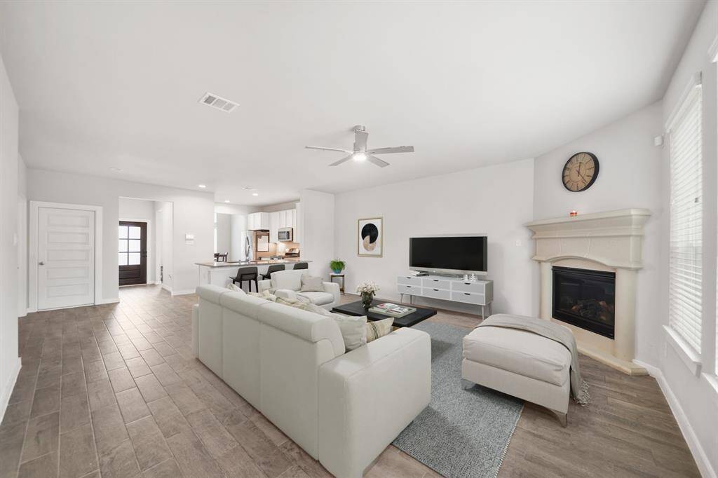 Virtually Staged: Fantastic open layout between the living room, and the kitchen.