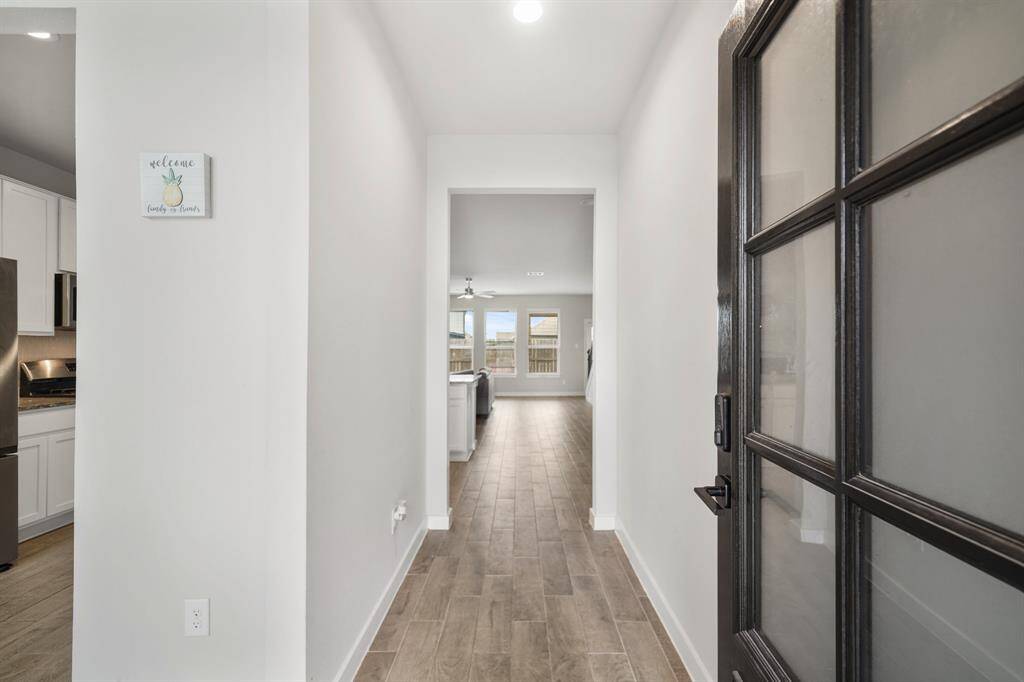 This home will greet you with beautiful natural lighting, tile flooring, and a fantastic view into the backyard.