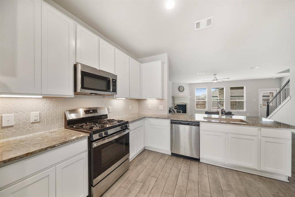 There are many wonderful upgrades in this kitchen including under cabinet lighting.