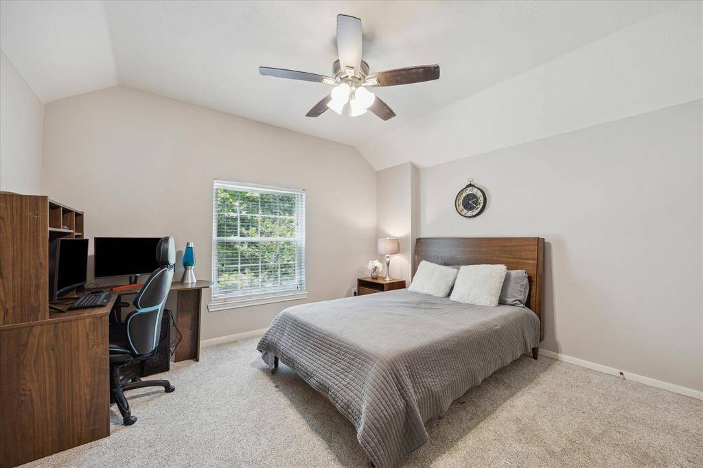 SECONDARY BEDROOM  One of three generous secondary bedroom upstairs, all have large closets and upgraded ceiling fans.