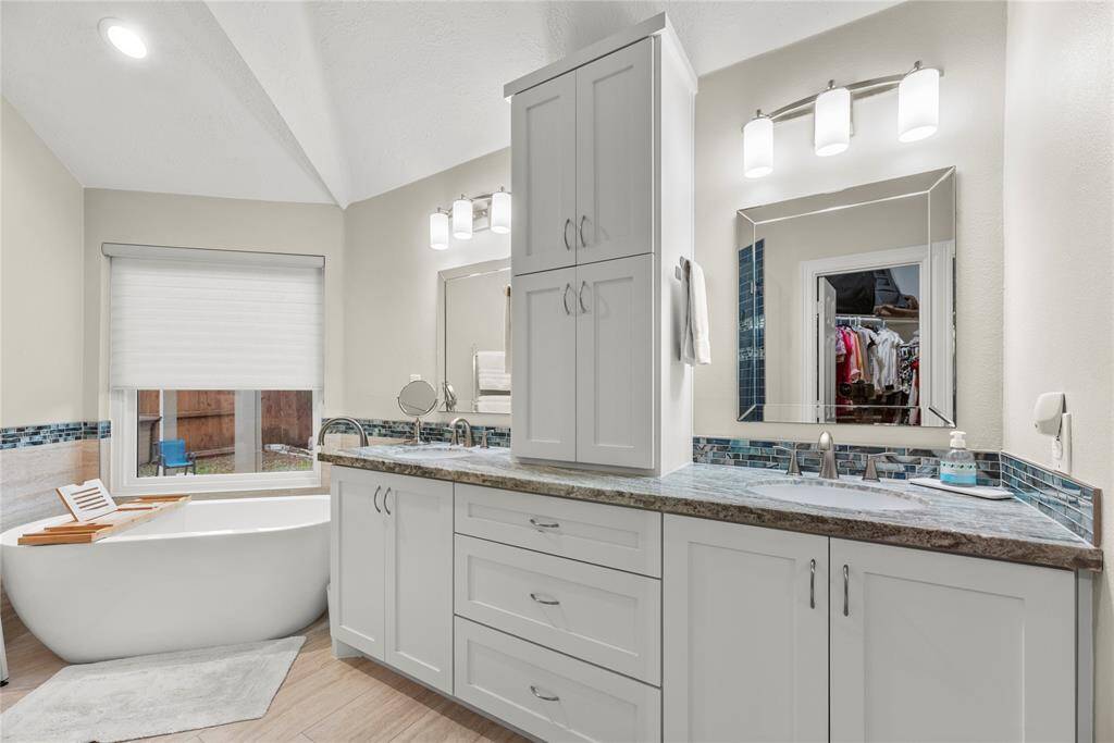 This elegantly designed space combines both functionality and style, transforming your daily routine into a spa-like experience.