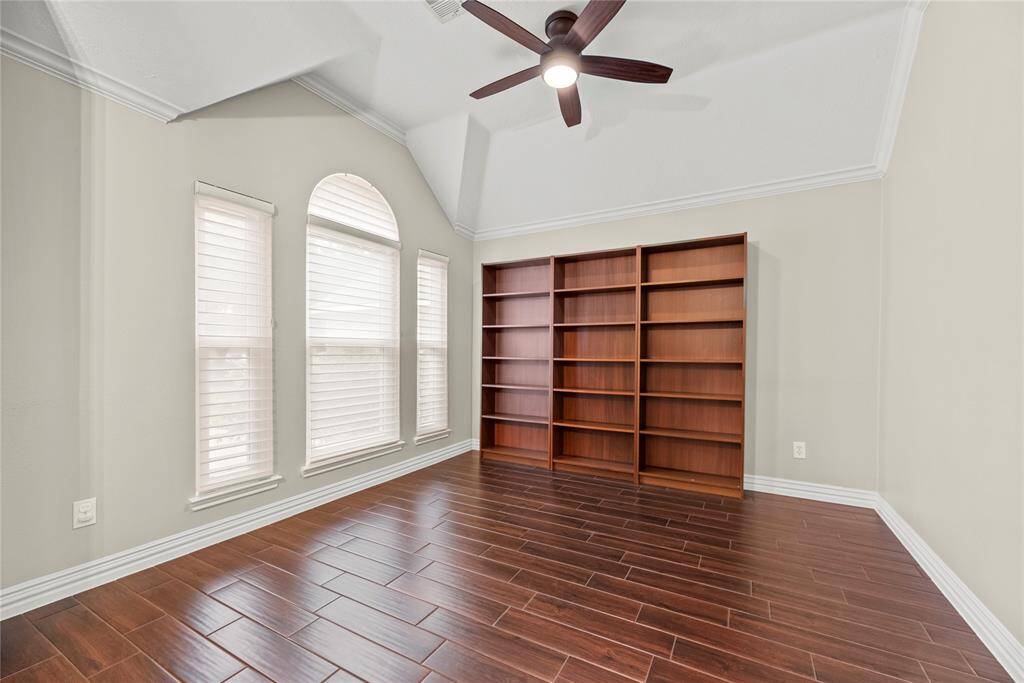 This spacious dining room is perfect for entertaining and will accommodate a large table, hutch, buffet or china cabinet. The combination of beautiful ceiling lines and tile flooring sets a stunning backdrop for the formal dining space, adding warmth, texture, and architectural interest.