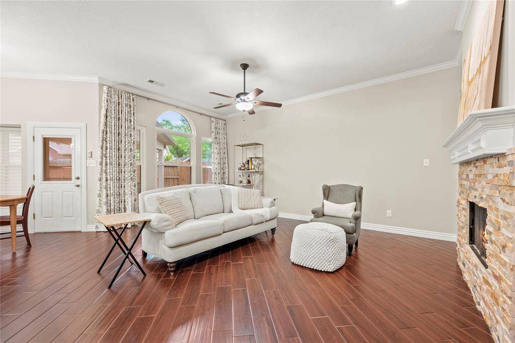 A large living area with a comfortable and inviting feel offers the perfect setting for relaxation and socializing.