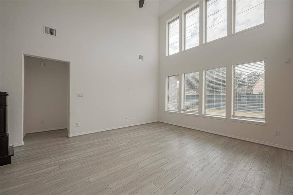Family room with tons of natural lighting.